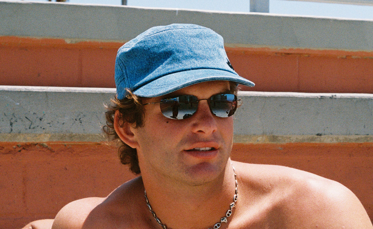 Denim Cadet Cap worn with sunglasses